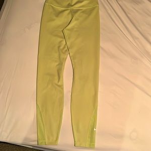 NWOT. never worn NIKE leggings. bright yellow- women's size SM